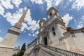 Sallustiano Obelisk and The church of the Santissima TrinitÃÂ  dei Monti against blue sky above Spanish Steps, Rome, Italy Royalty Free Stock Photo